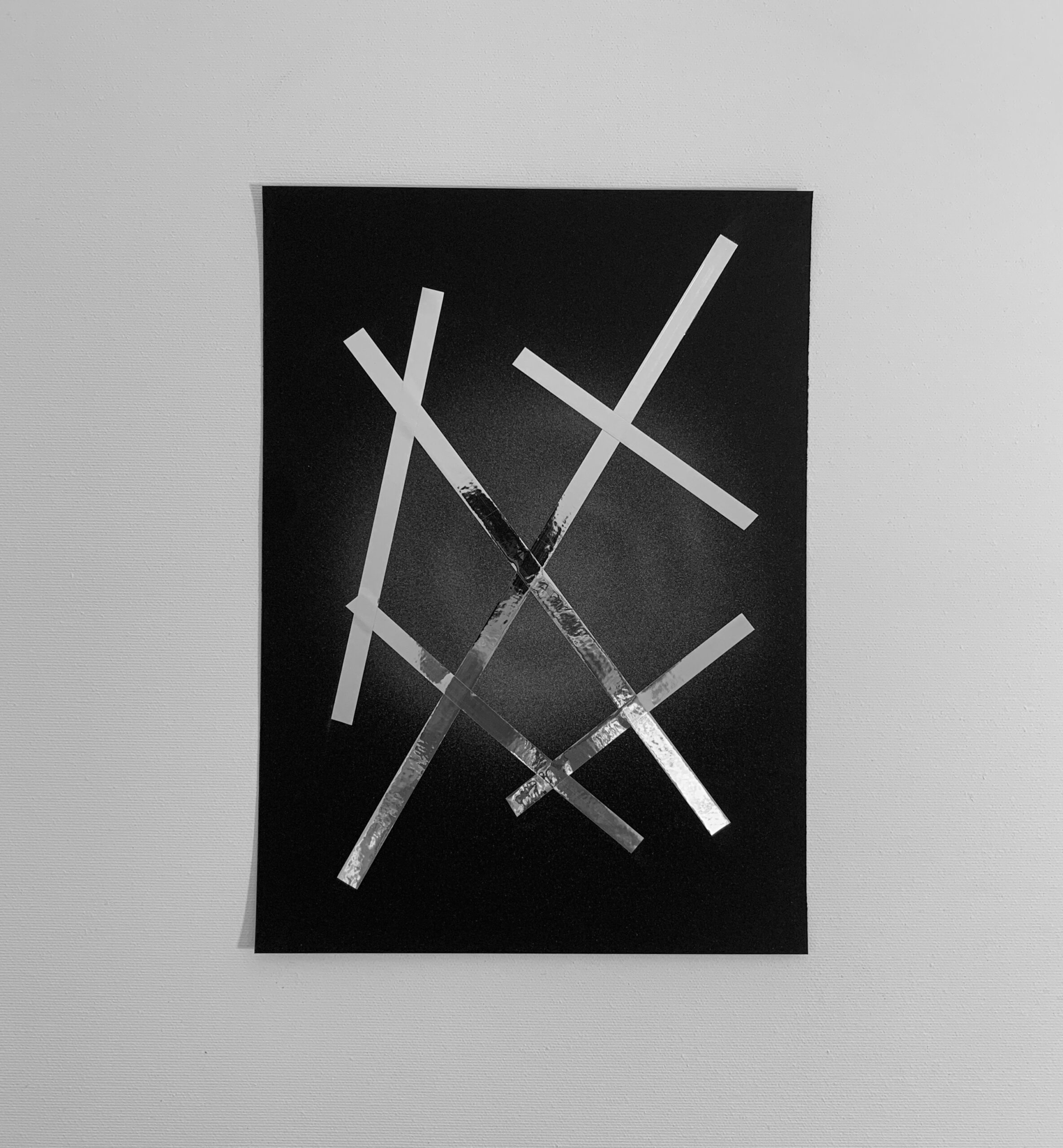 BLACK SILVER PAPER ACROSS 1